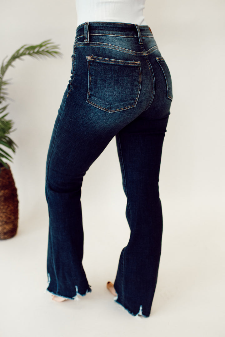 Judy Blue Charity Mid Rise Distressed Hem Bootcut Jeans (Dark Wash)